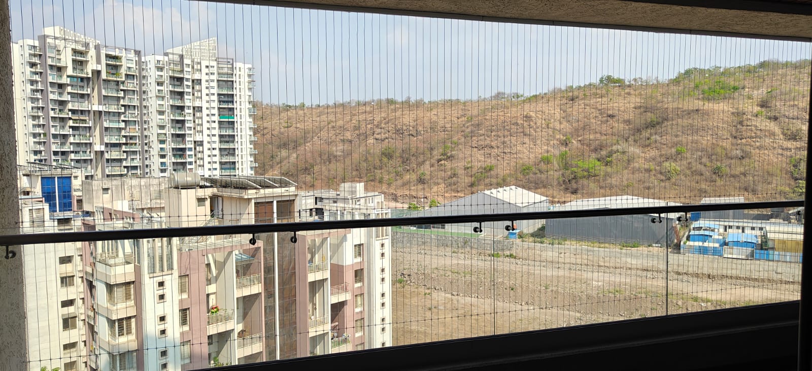 Daylight invisible grill balcony overlooking the hills